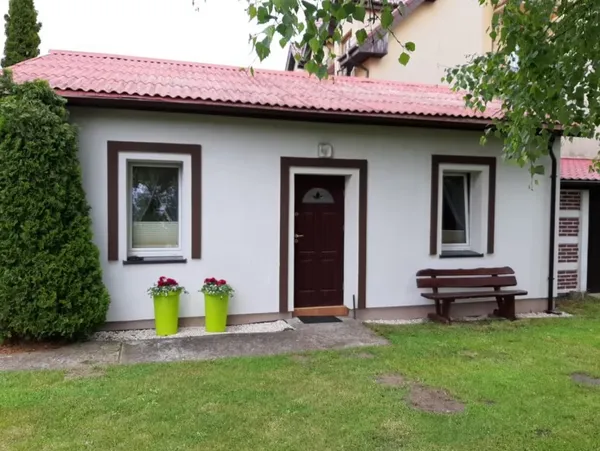 Pokoje Gościnne "Pod Modrzewiem" - Dąbki, Poland